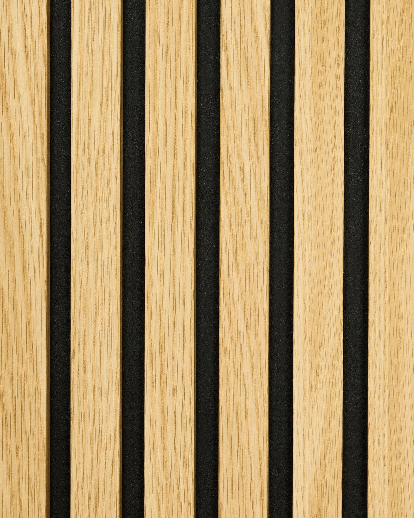 Akupanel acoustic panel sample in Southern Oak with vertical light wood slats and uniform black gaps for a minimalist, Nordic-inspired striped appearance.